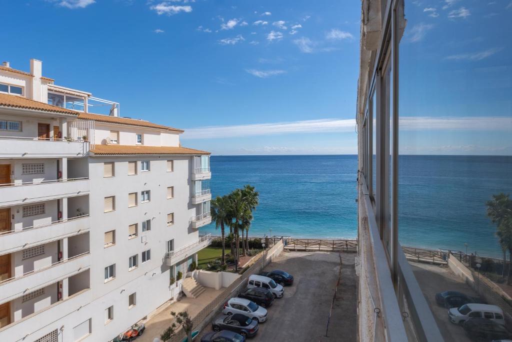 a view of the ocean from a building at A pie de playa con Ascensor y Workspace By DelucaCo in Altea