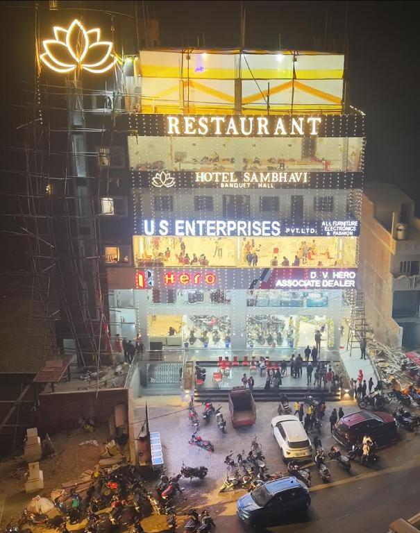 a view of a building with motorcycles parked in front at Hotel Sambhavi in Hisua