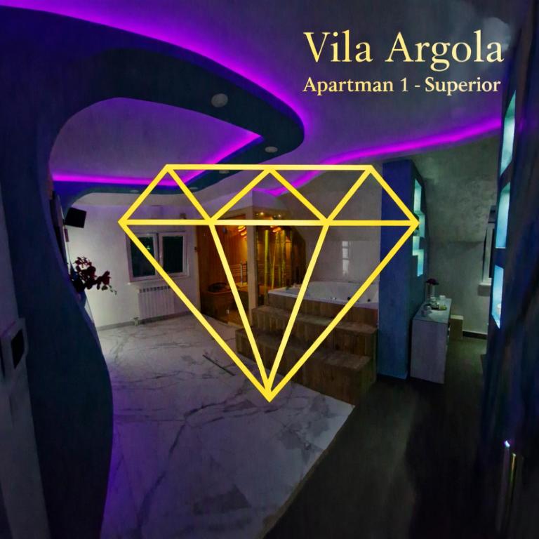 a room with a purple and yellow neon sign at Vila Argola - Spa Luxury Apartments in Belgrade