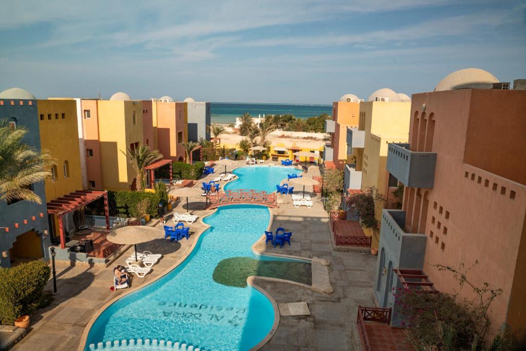 an aerial view of a resort with a swimming pool at Al Dora Boutique Hotel in Hurghada