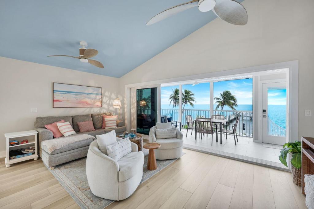 a living room with a view of the ocean at Captiva Hide A Way 2D in Captiva