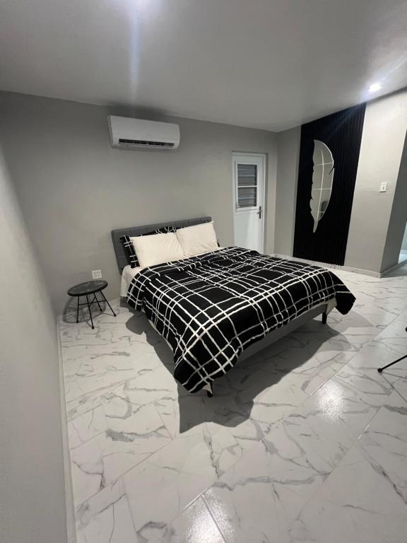 เตียงในห้องที่ Molinos House 5