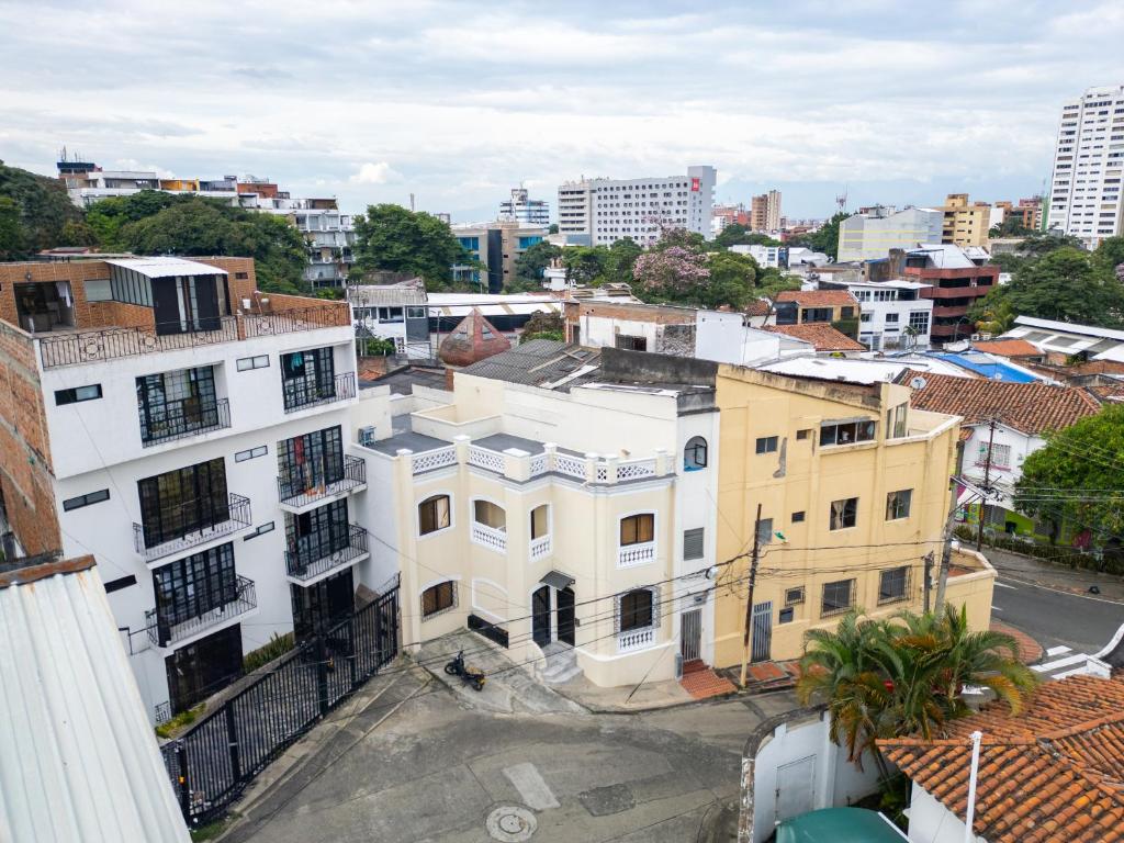 an aerial view of a city with buildings at Piazza Granada in Cali
