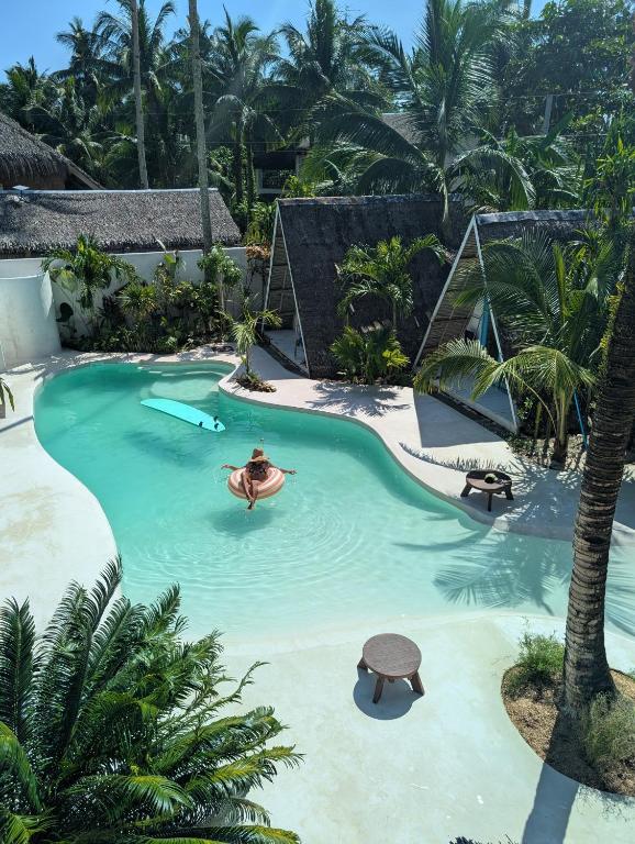 an image of a swimming pool in a resort at Mao Mao surf in General Luna