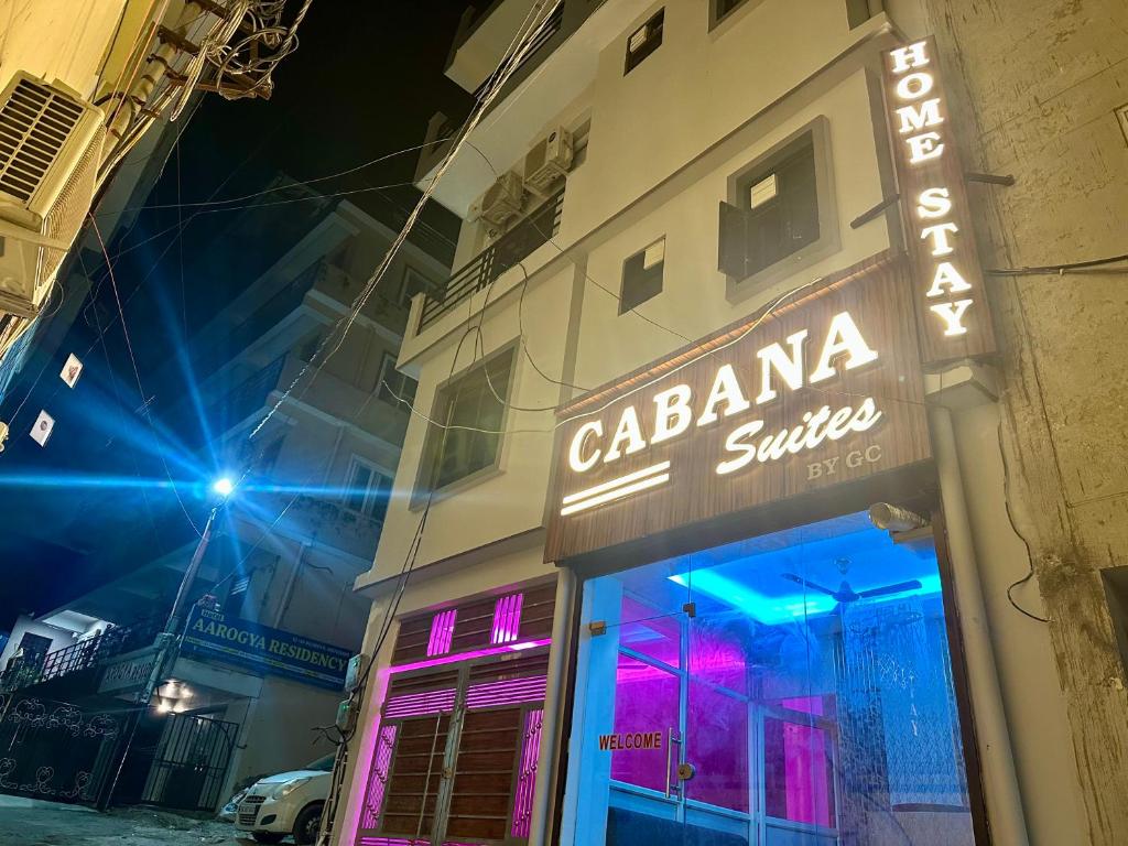 a building with a sign that reads calaba salsa at Cabana suites in Rishīkesh