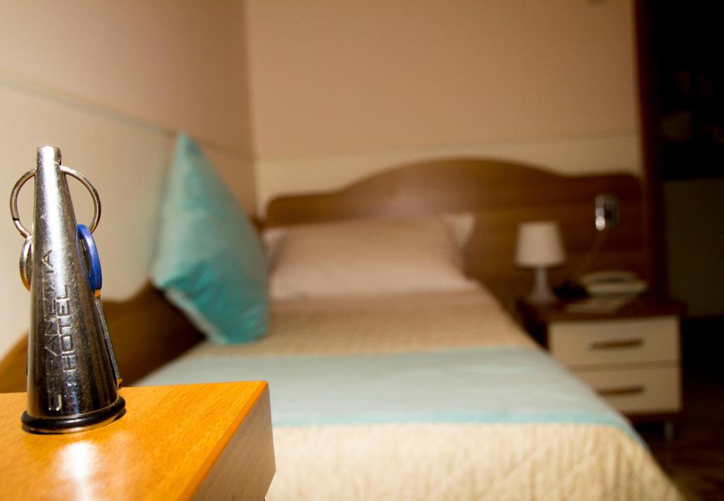 Postel nebo postele na pokoji v ubytování Hotel Ristorante Sbranetta