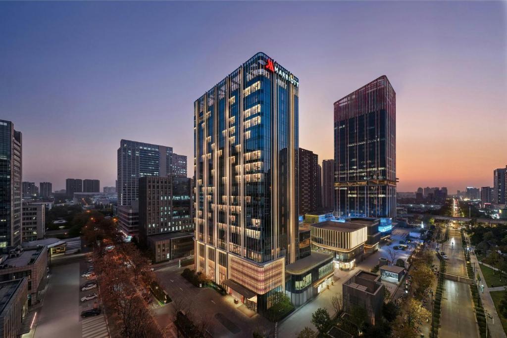 a rendering of a tall building in a city at Xi'an Marriott Hotel High-Tech Zone in Xi'an