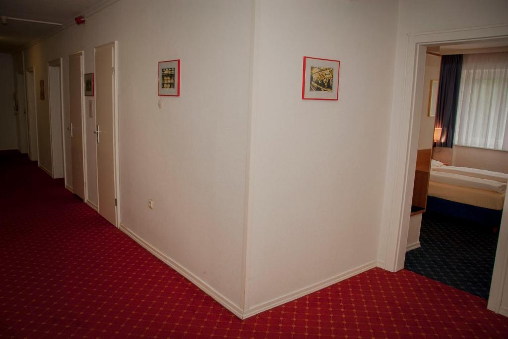 Postel nebo postele na pokoji v ubytování Elbbrücken Hotel