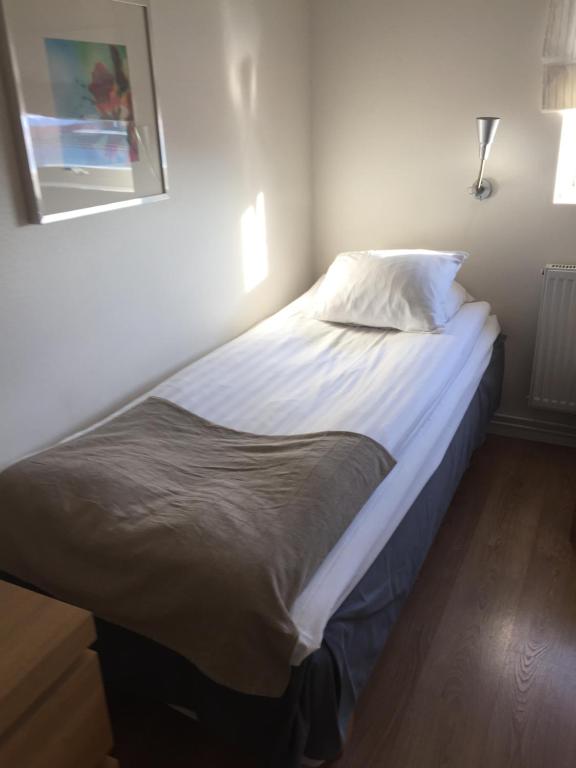 Postel nebo postele na pokoji v ubytování Hotel E-10 by First