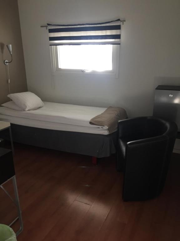 Postel nebo postele na pokoji v ubytování Hotel E-10 by First