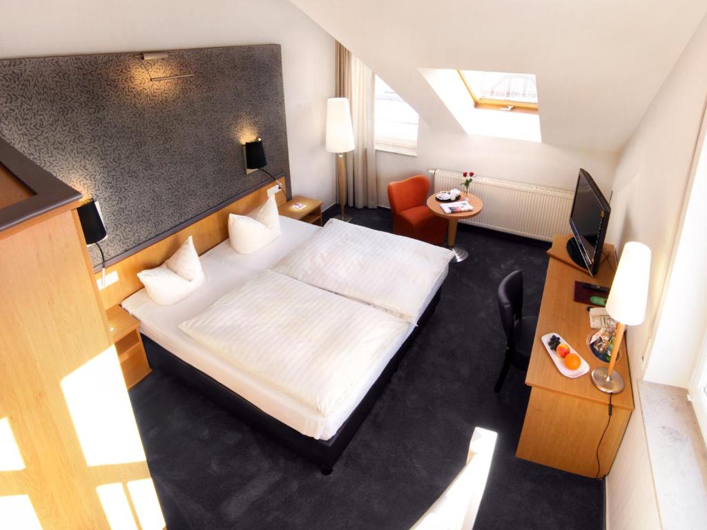 Postel nebo postele na pokoji v ubytování Hotel Hiemann - Superior