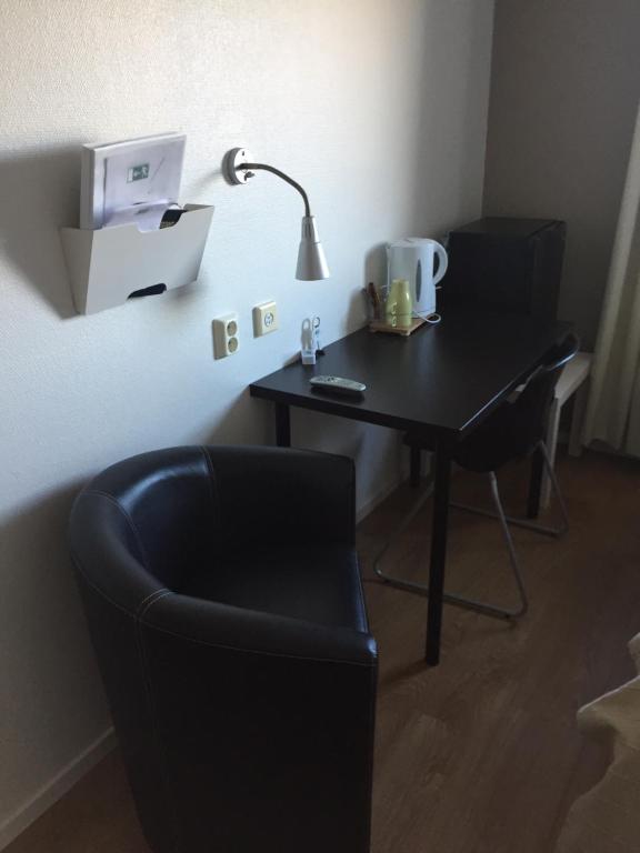 Posezení v ubytování Hotel E-10 by First