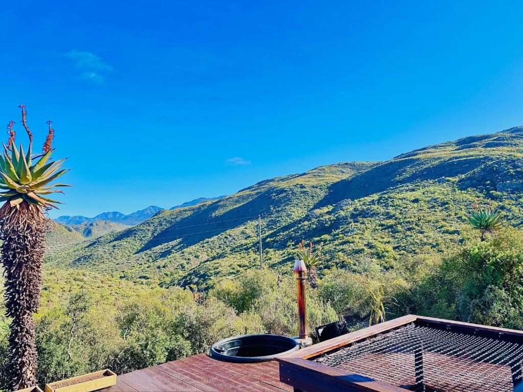 a view of a mountain from the roof of a house at Matilo Cabins - Cactus Deck with Hot-tub and Fireplace in Calitzdorp