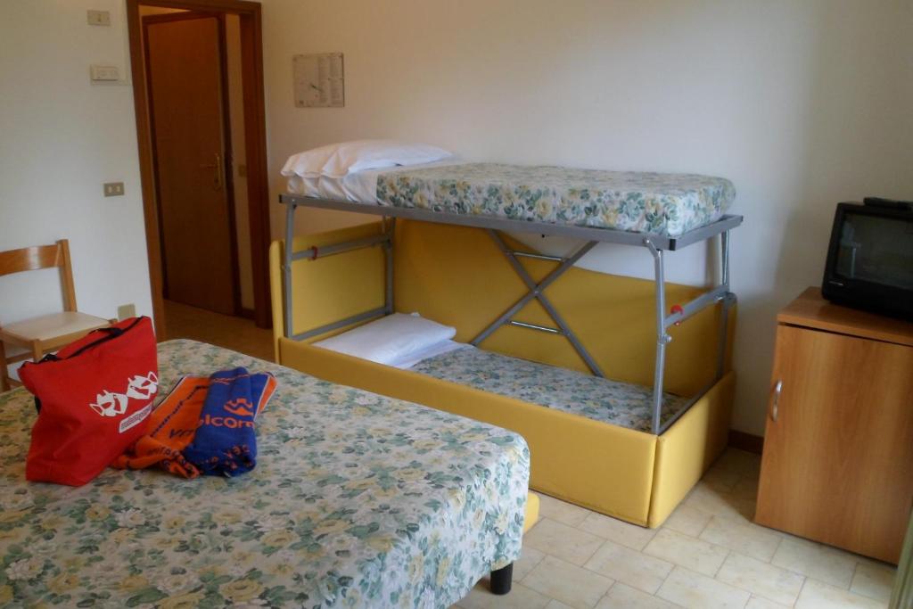 Postel nebo postele na pokoji v ubytování B&B Domus Mea