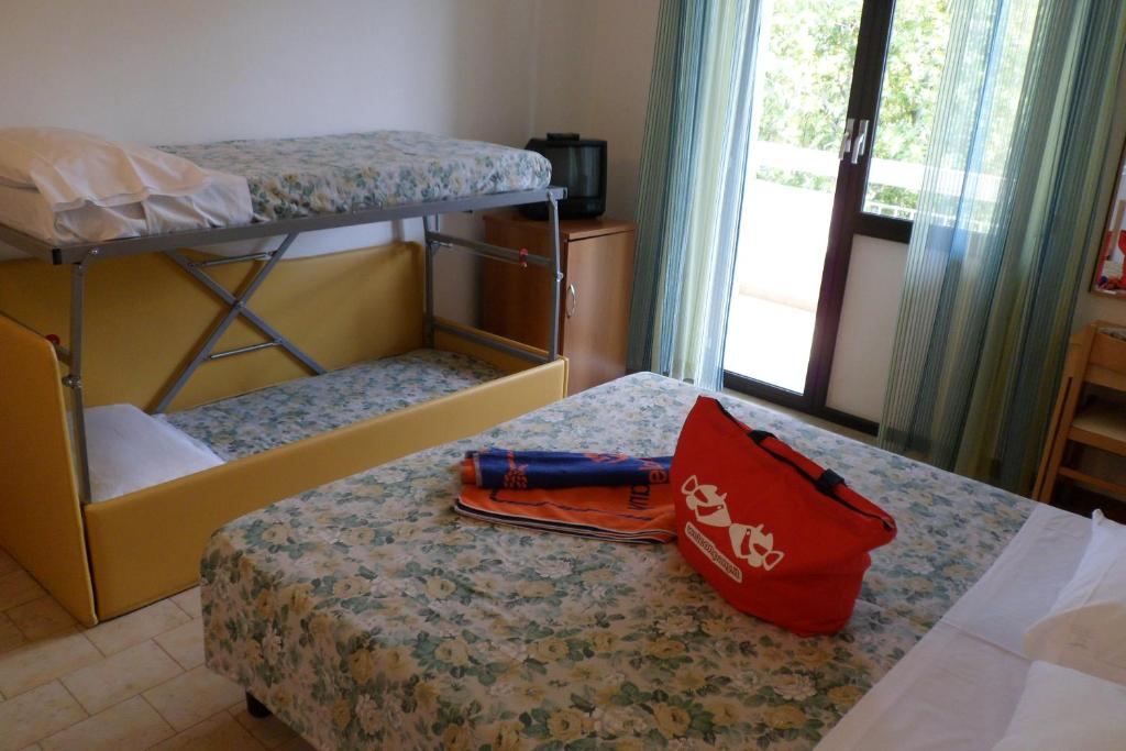 Postel nebo postele na pokoji v ubytování B&B Domus Mea