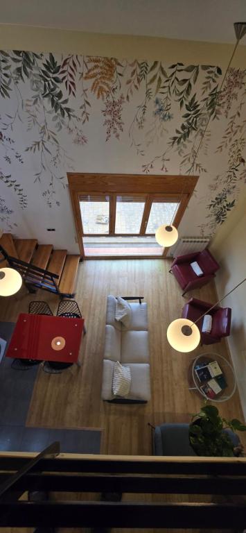 an overhead view of a living room with a couch at Mirador del Torreón in Alcañiz