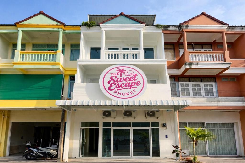 a building with a sign that reads the sweet escape jumps at The Sweet Escape in Ban Kathu (1)