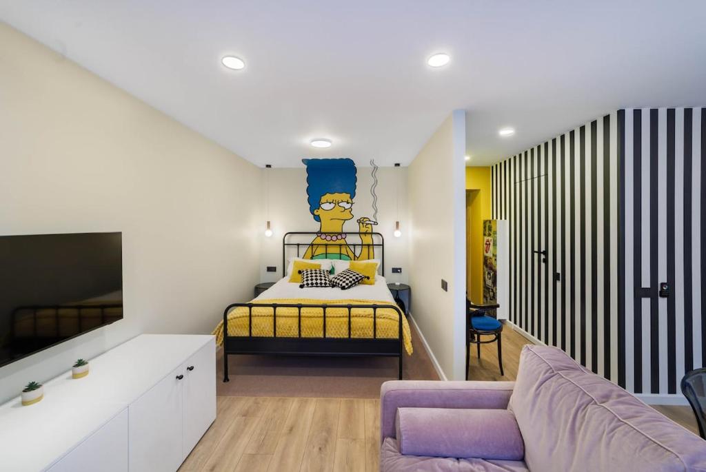a bedroom with a bunk bed and a couch at Stilinga studija su visais patogumais in Šiauliai