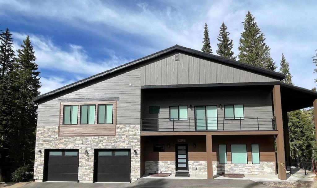 a large house with a garage at Silverview Lodge in Brighton