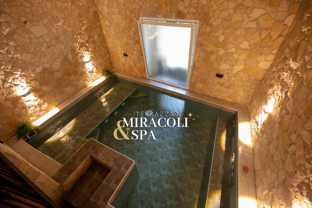an overhead view of a staircase in a building with a window at Terrazza Miracoli & Spa Napoli in Naples
