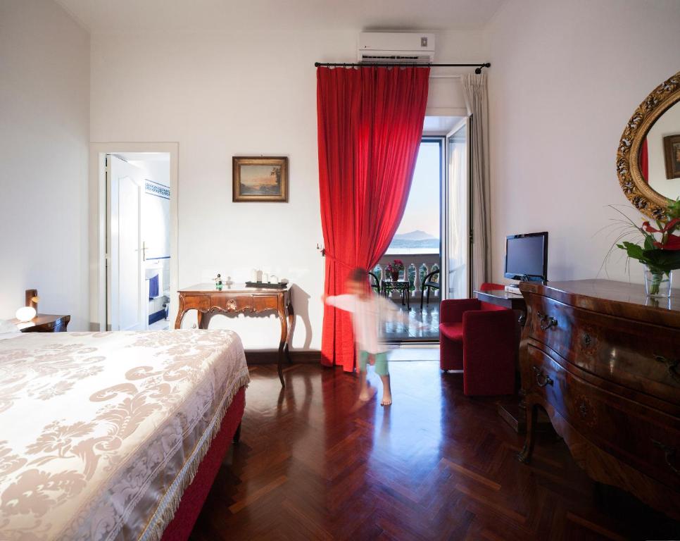 TV a/nebo společenská místnost v ubytování B&B Dumbolo