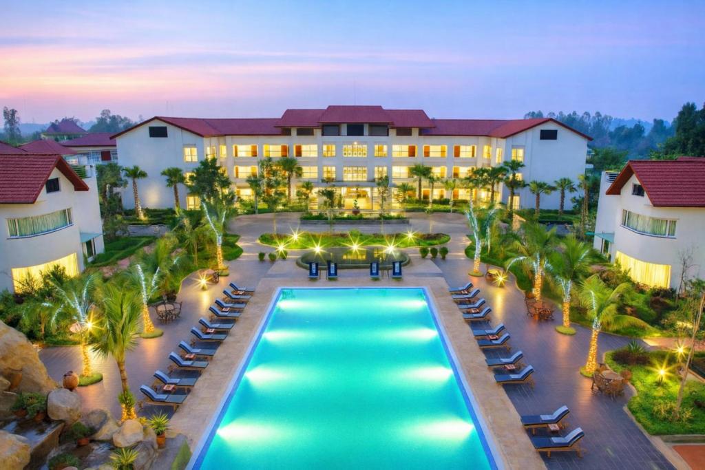 an aerial view of a resort with a swimming pool at EG Paradise Angkor Villa Hotel in Siem Reap