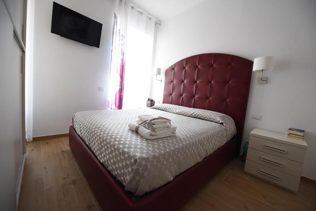 Postel nebo postele na pokoji v ubytování BeB Pignatelli Affittacamere