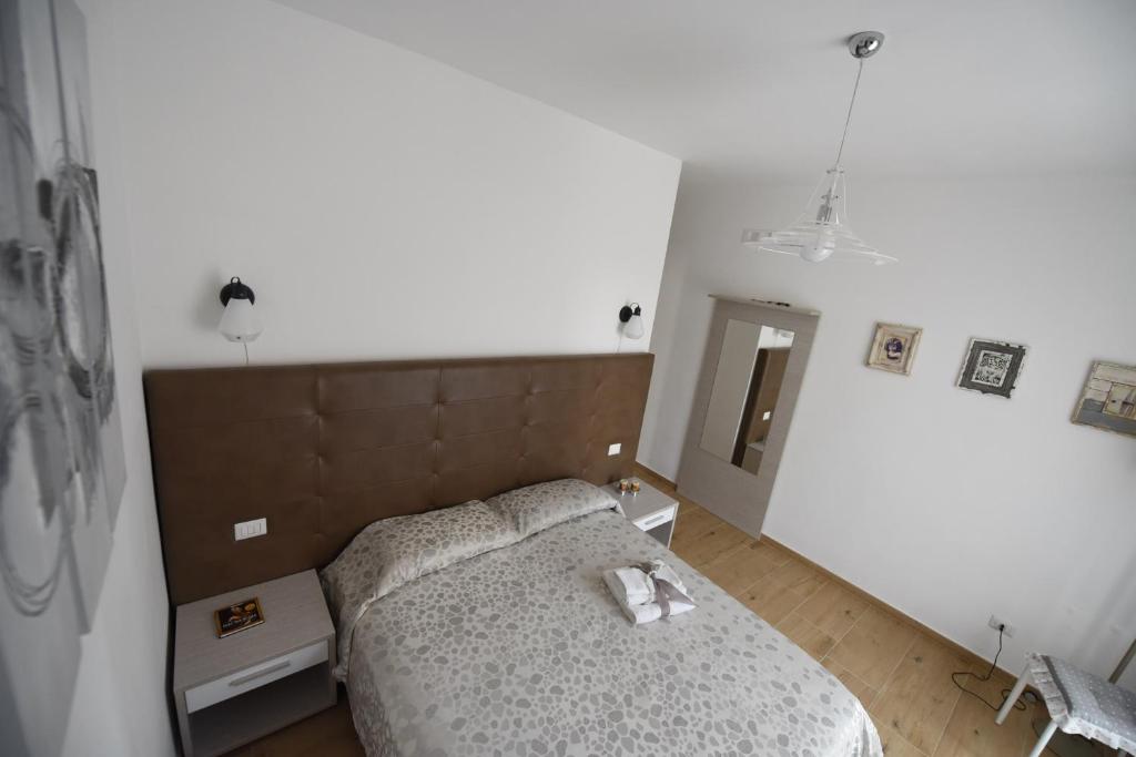 Postel nebo postele na pokoji v ubytování BeB Pignatelli Affittacamere