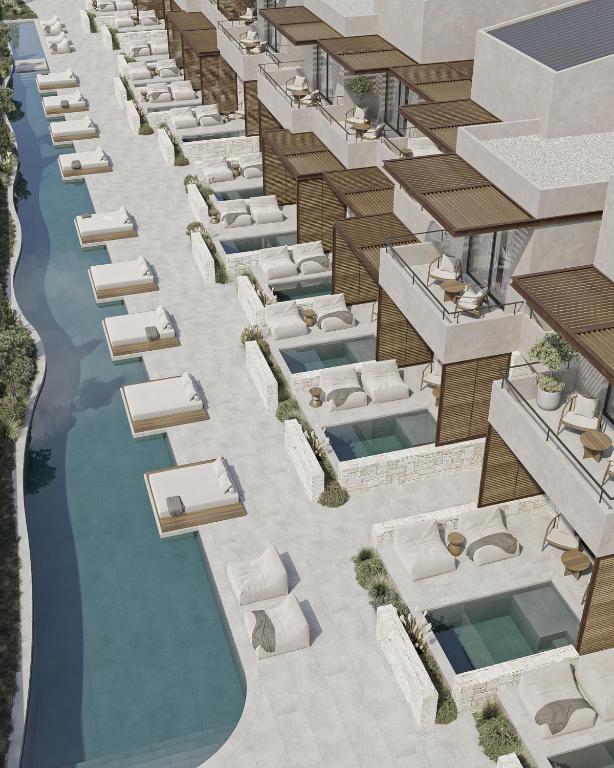 eine architektonische Darstellung eines Hotels mit Pool in der Unterkunft Okeanis Elysium in Daratso