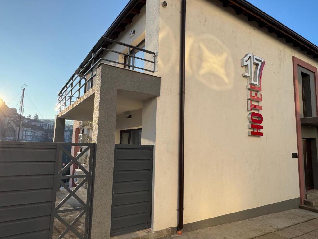 a building with a sign on the side of it at Hotel17 in Belogradchik