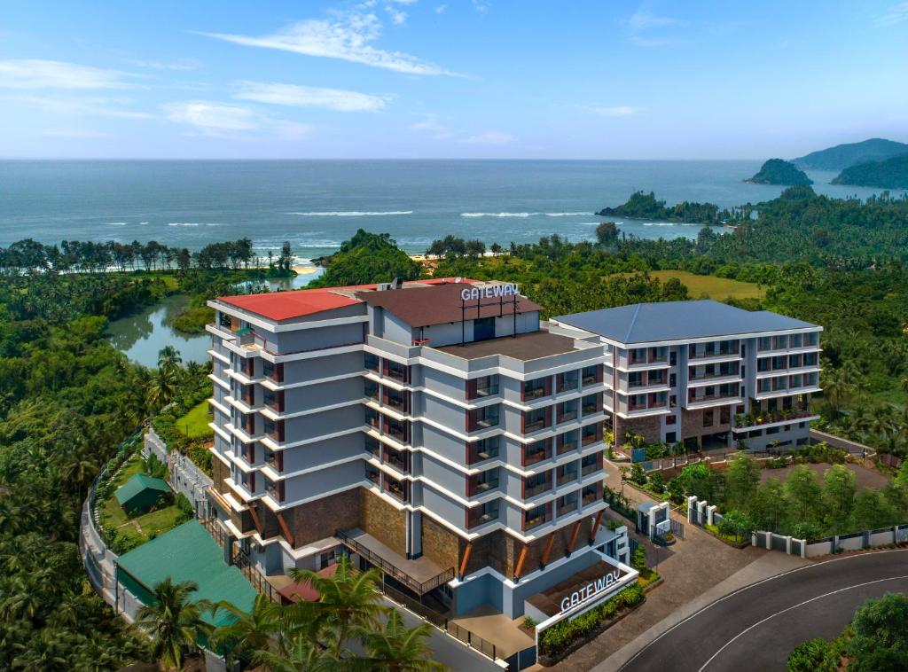 an overhead view of a building with the ocean in the background at Gateway Goa, Palolem in Palolem