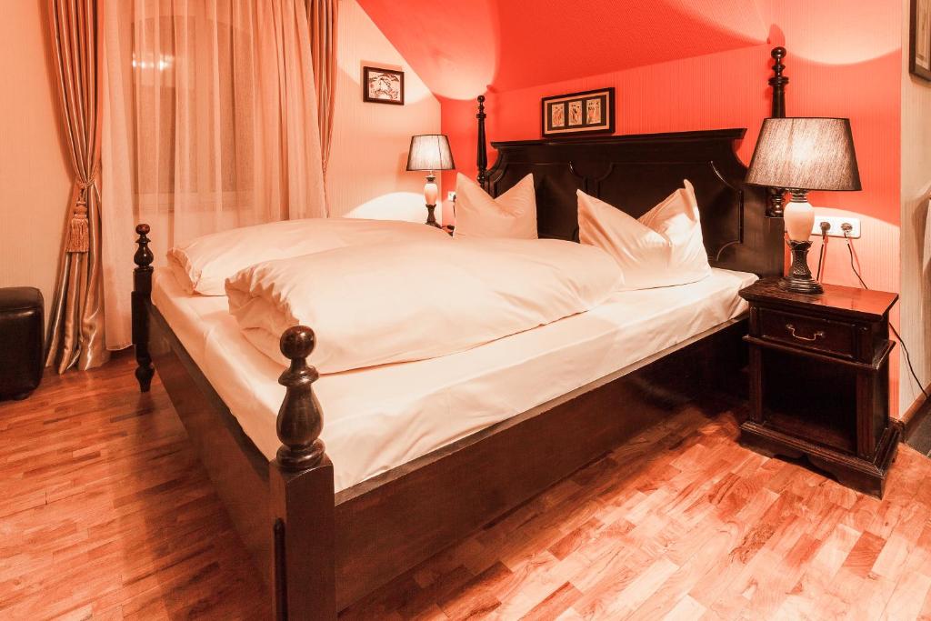 Ένα ή περισσότερα κρεβάτια σε δωμάτιο στο Hotel Aviv Dresden