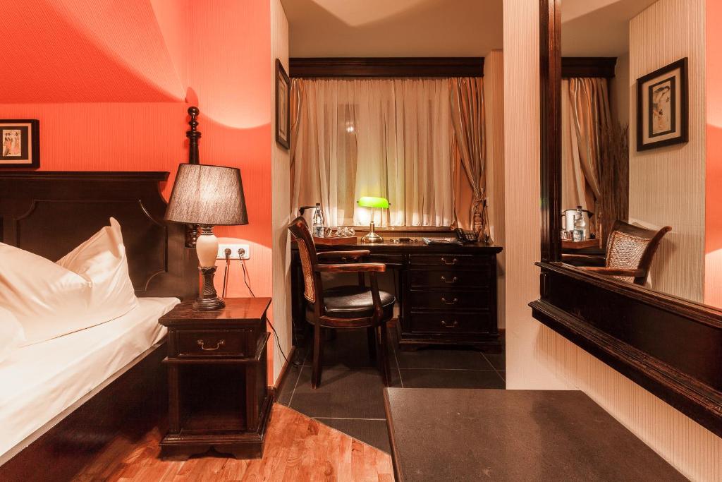 Ένα ή περισσότερα κρεβάτια σε δωμάτιο στο Hotel Aviv Dresden