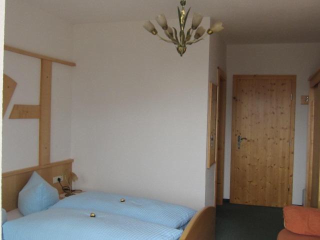 Postel nebo postele na pokoji v ubytování Wirtshaus zum Wiesejaggl