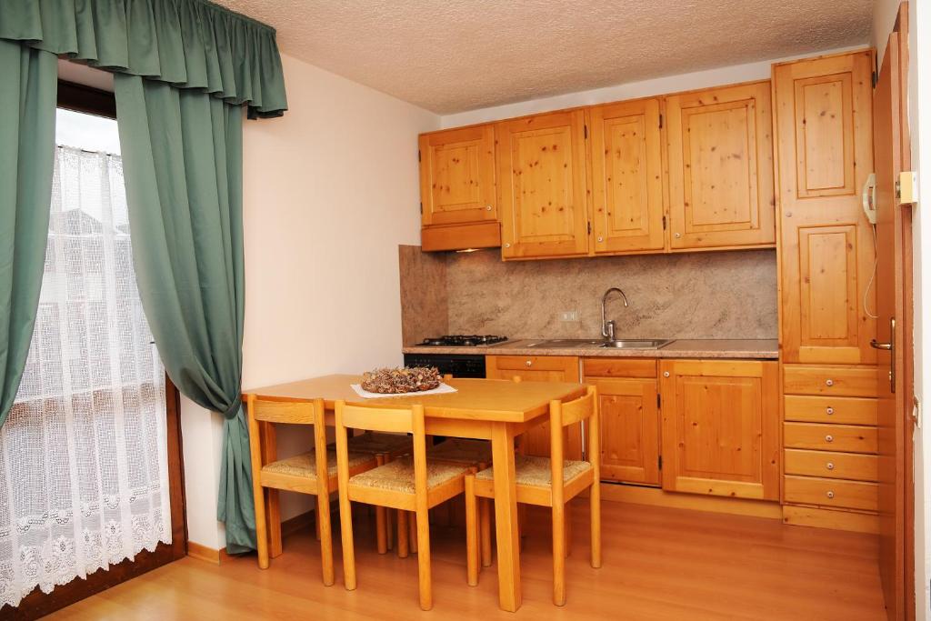 Kuchyň nebo kuchyňský kout v ubytování Residence Marisol Camere & Appartamenti - Mezzana Centre