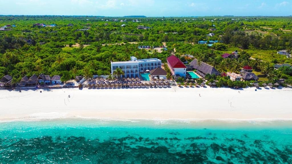 an aerial view of a resort on a beach at AHG Sun Bay Mlilile Beach Hotel in Matemwe