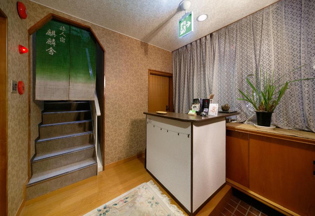 Kuchyň nebo kuchyňský kout v ubytování Travellersdou Kirinya