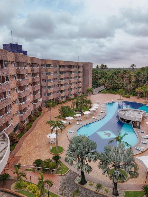 an aerial view of a resort with a swimming pool at Hotel em Barreirinhas in Barreirinhas