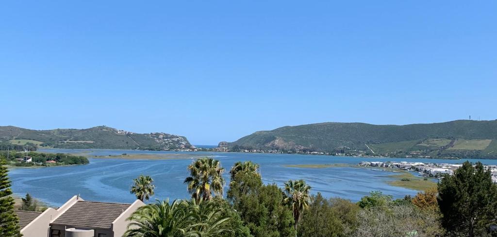 a view of a river with mountains in the background at Deja View in Knysna