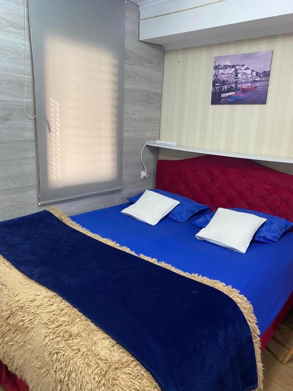 เตียงในห้องที่ Hotels