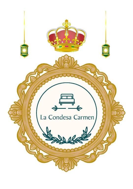a gold frame with a crown on top of it at El Refugio de La Condesa Carmen in Manzanares
