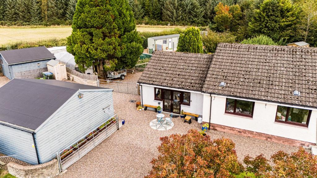 an overhead view of a house with a barn at The Hive at Bee Happy Breaks Scotland in Perth