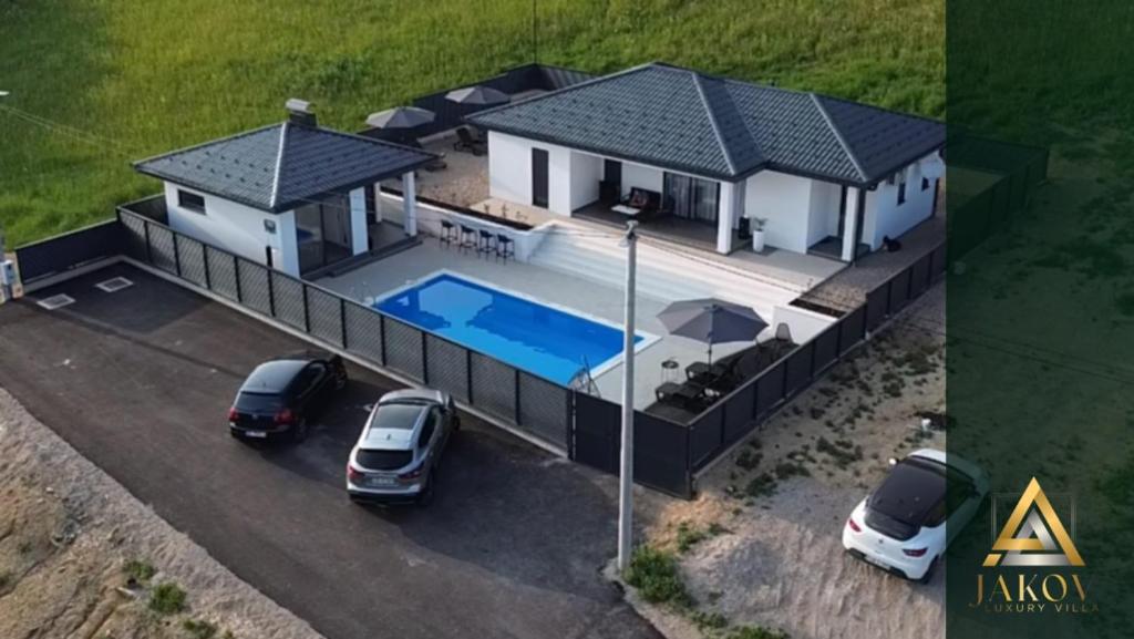 a rendering of a house with a swimming pool at Luxury Villa JAKOV in Banja Luka