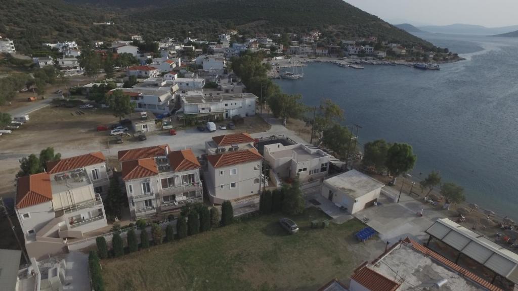 an aerial view of a town next to the water at Korali in Almiropótamos