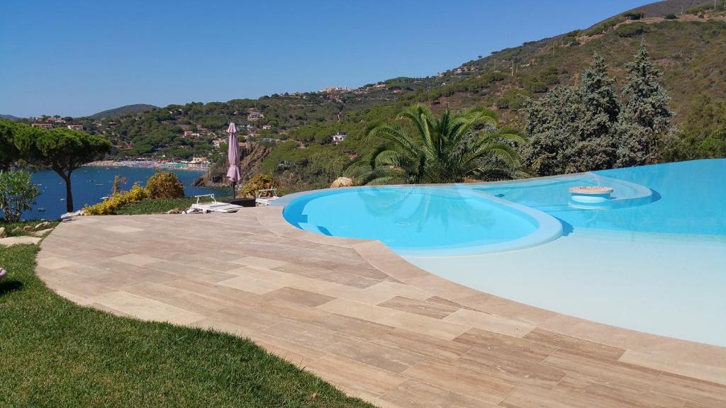 Бассейн в Residence Cala Silente или поблизости