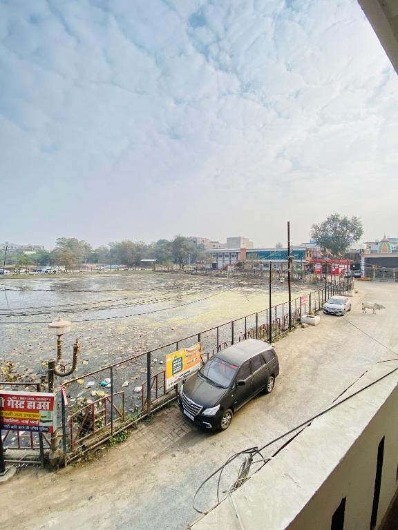 a car parked on the side of a road at The star inn in Ambikāpur