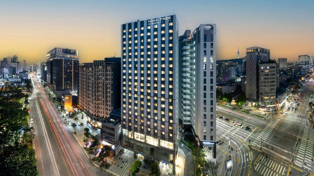 a view of a city with tall buildings at Nine Tree by Parnas Seoul Dongdaemun in Seoul