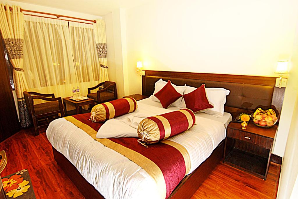 Postel nebo postele na pokoji v ubytování Hotel Buddha