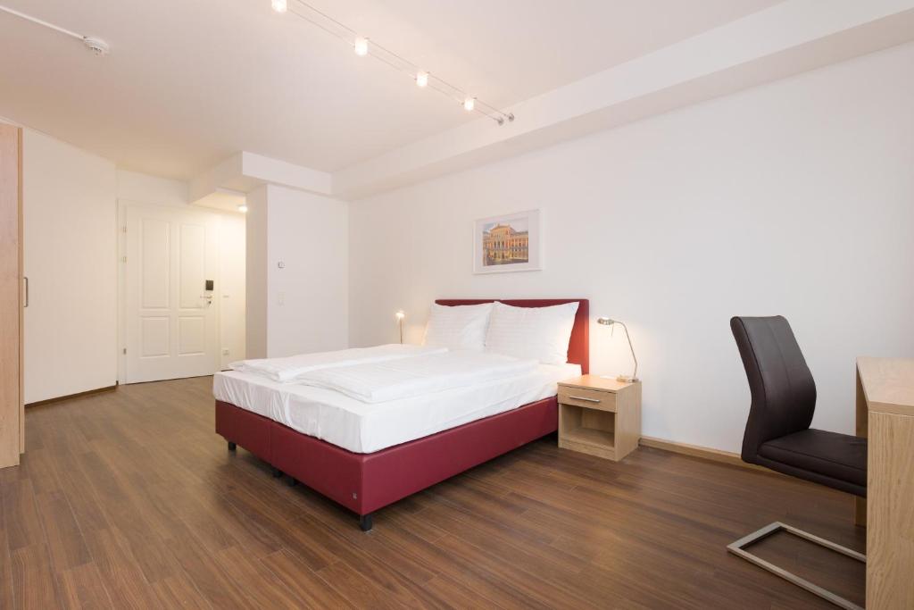 Postel nebo postele na pokoji v ubytování Vienna Stay Apartments or Rooms 1050