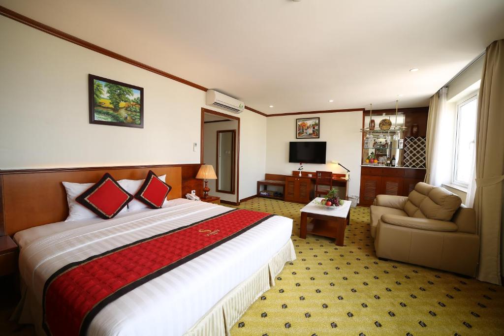 Postel nebo postele na pokoji v ubytování Sunny Hotel 1